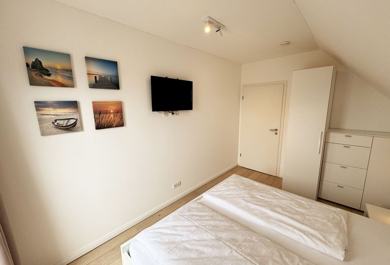Ferienhaus Ilsebill - 2. Schlafzimmer mit TV