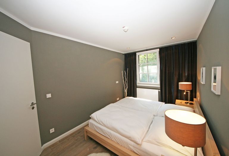 Haus Meeresblick A 4.03 Urlaubsglück -Schlafzimmer mit Doppelbett Haus Meeresblick A 4.03 Urlaubsglück -Schlafzimmer mit Doppelbett