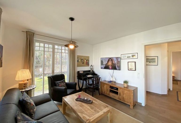 Wohnzimmer mit gemütlicher Ledercouch Wohnzimmer mit gemütlicher Ledercouch