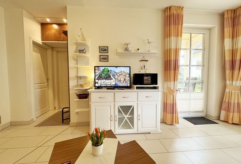 Wohnbereich mit Zugang zur Terrasse Wohnbereich mit Zugang zur Terrasse