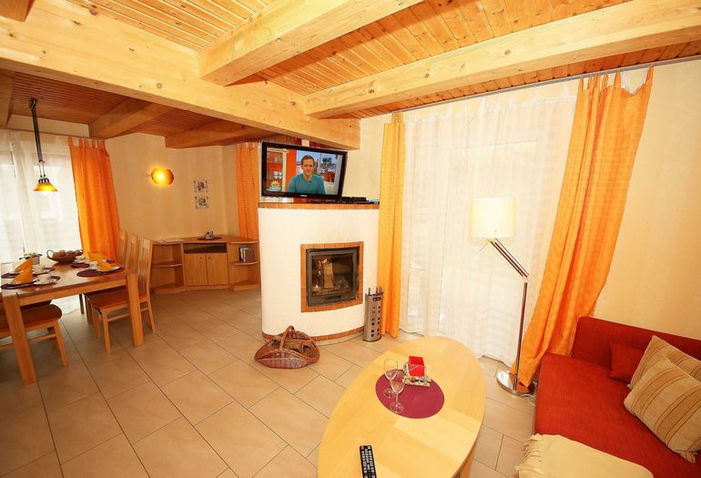 Wohnbereich mit Kamin Wohnbereich mit Kamin