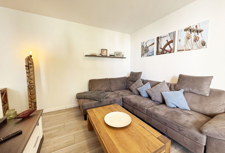 gemütlicher Wohnbereich mit Couch gemütlicher Wohnbereich mit Couch