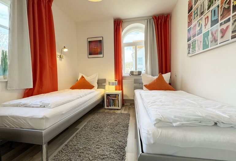 Villa Wilhelmine WE 04 Schlafzimmer mit 2 Einzelbetten Villa Wilhelmine WE 04 Schlafzimmer mit 2 Einzelbetten