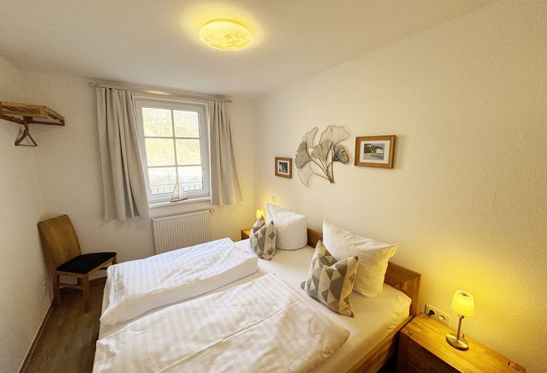 1. Schlafzimmer mit Doppelbett 1. Schlafzimmer mit Doppelbett