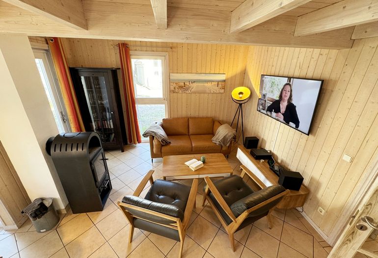Ferienhaus Sprottenkiste - Wohnzimmer mit Kamin