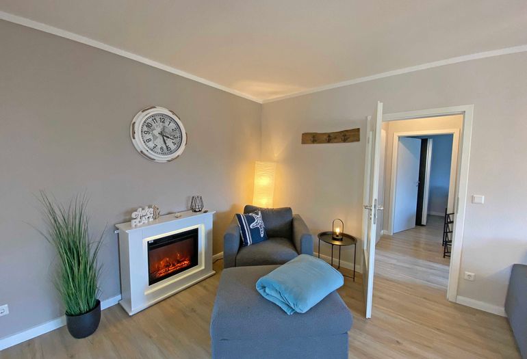 Wohnzimmer mit Elektrokamin