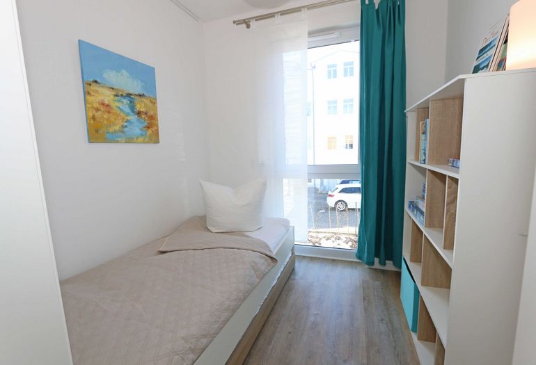 1. Schlafzimmer mit Einzelbett 1. Schlafzimmer mit Einzelbett