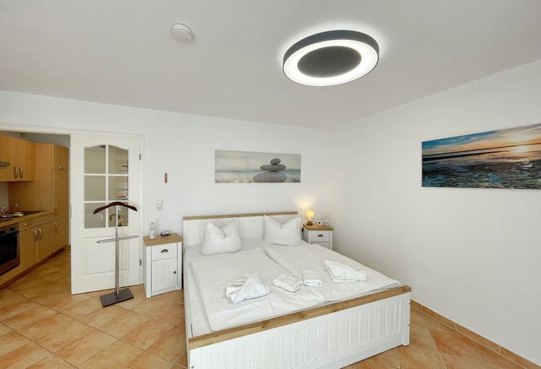 Schlafbereich mit Doppelbett