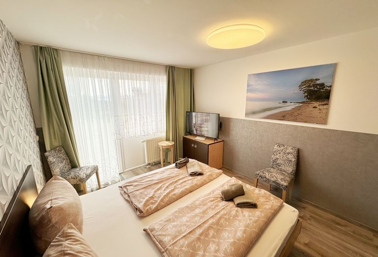 Schlaf-/Wohnbereich mit Zugang zur Terrasse Schlaf-/Wohnbereich mit Zugang zur Terrasse