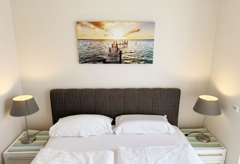 1. Schlafzimmer mit Doppelbett 1. Schlafzimmer mit Doppelbett