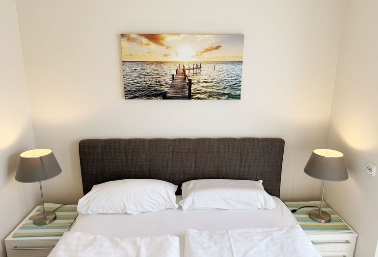 1. Schlafzimmer mit Doppelbett 1. Schlafzimmer mit Doppelbett