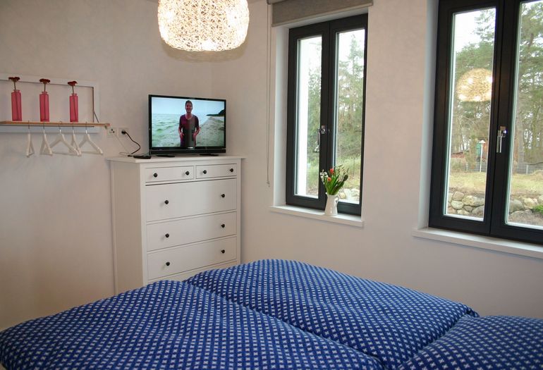 Strandvilla Andrea WE 07 - 2. Schlafzimmer mit TV Strandvilla Andrea WE 07 - 2. Schlafzimmer mit TV
