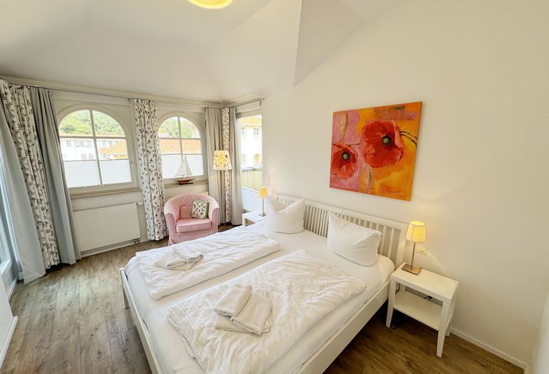 1. Schlafzimmer mit Zugang zur Dachterrasse 1. Schlafzimmer mit Zugang zur Dachterrasse