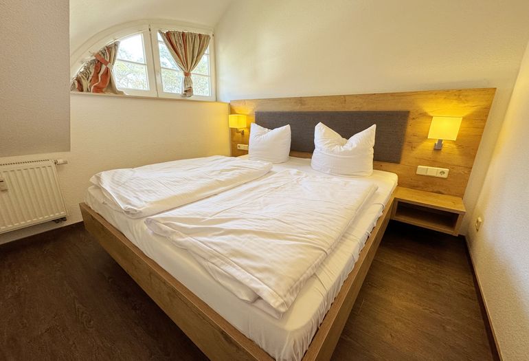 Schlafzimmer mit Doppelbett Schlafzimmer mit Doppelbett