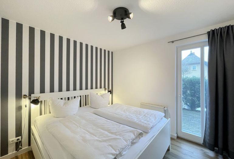 Schlafzimmer mit Doppelbett