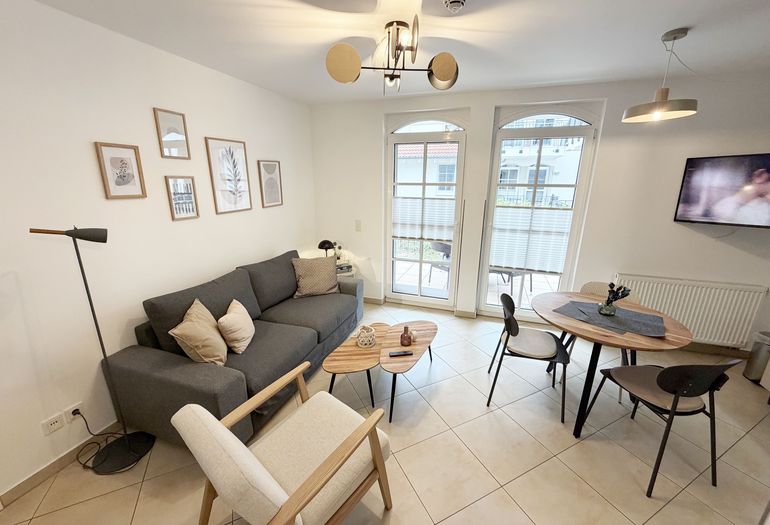 Haus Meeresblick A 1.26 Seegeflüster - Wohnzimmer Haus Meeresblick A 1.26 Seegeflüster - Wohnzimmer