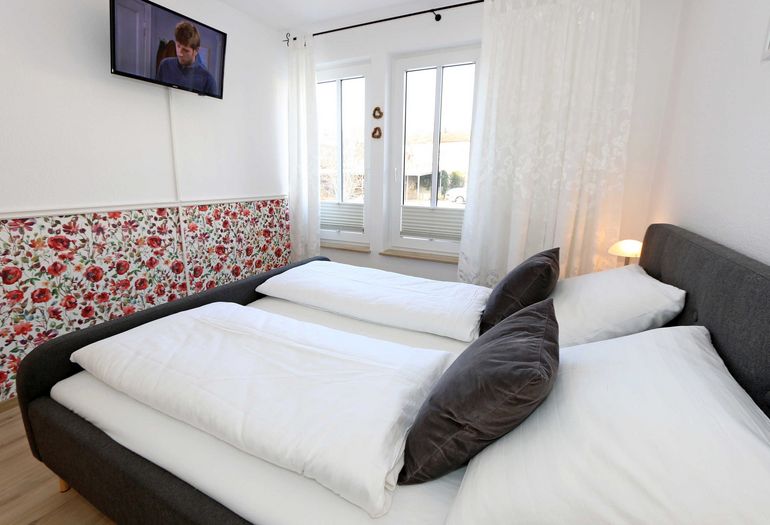 Schlafzimmer mit Doppelbett Schlafzimmer mit Doppelbett