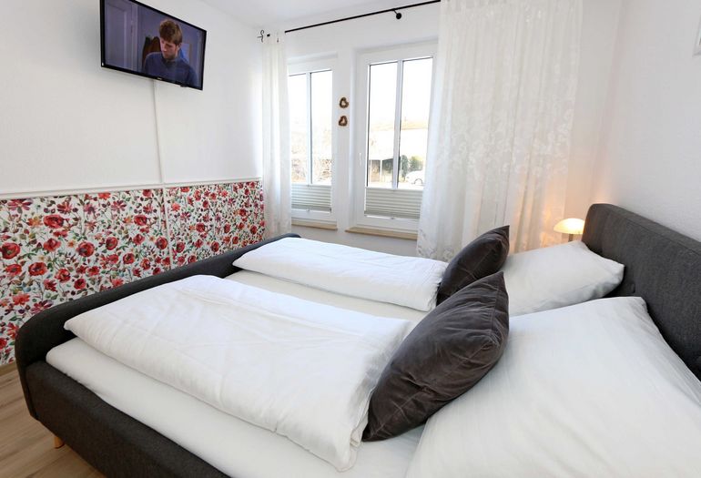 Schlafzimmer mit Doppelbett Schlafzimmer mit Doppelbett