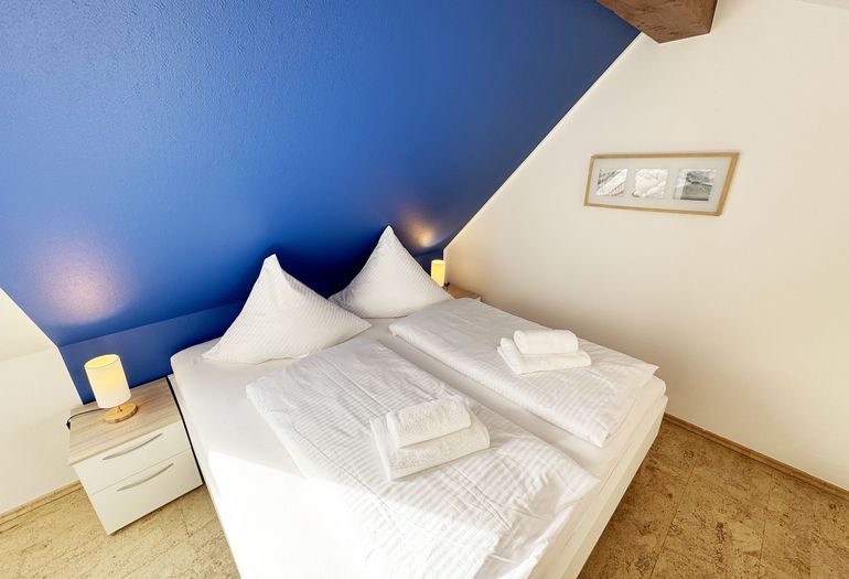 Schlafzimmer mit Doppelbett Schlafzimmer mit Doppelbett