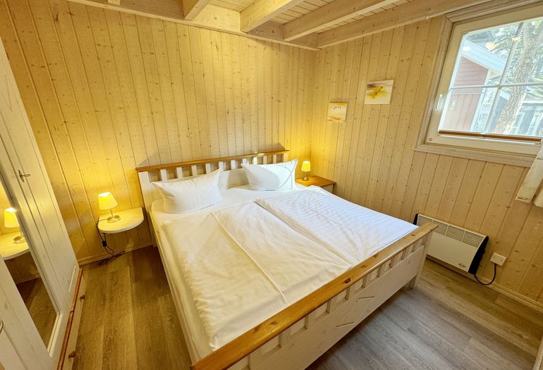 Ferienhaus Sprottenkiste - Schlafzimmer mit Doppelbett Ferienhaus Sprottenkiste - Schlafzimmer mit Doppelbett
