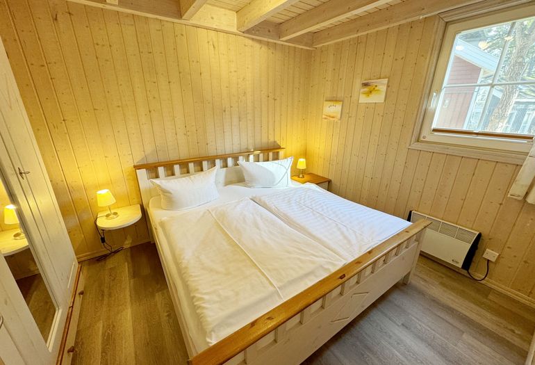 Ferienhaus Sprottenkiste - Schlafzimmer mit Doppelbett Ferienhaus Sprottenkiste - Schlafzimmer mit Doppelbett