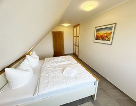 Zollhaus Klein Zicker - Wohnung 05 mit Südbalkon und Meerblick