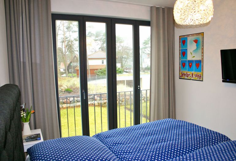 Strandvilla Andrea WE 07 - 1. Schlafzimmer mit TV Strandvilla Andrea WE 07 - 1. Schlafzimmer mit TV