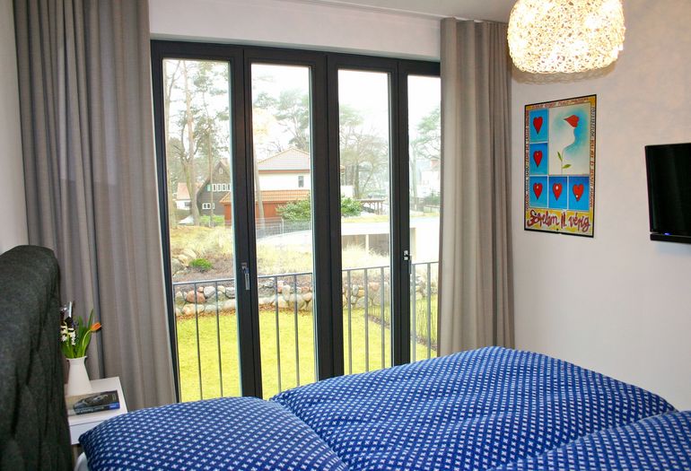 Strandvilla Andrea WE 07 - 1. Schlafzimmer mit TV Strandvilla Andrea WE 07 - 1. Schlafzimmer mit TV