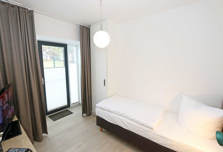 1. Schlafzimmer mit Einzelbett 1. Schlafzimmer mit Einzelbett