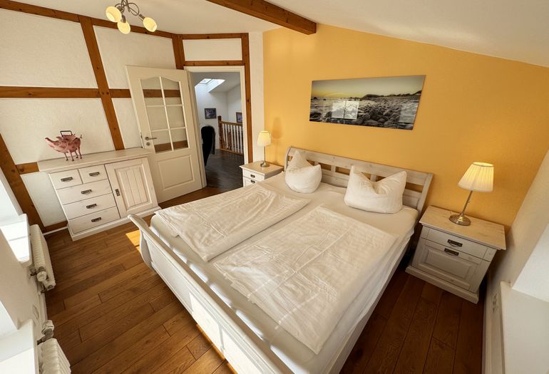 Schlafzimmer im Obergeschoss Schlafzimmer im Obergeschoss