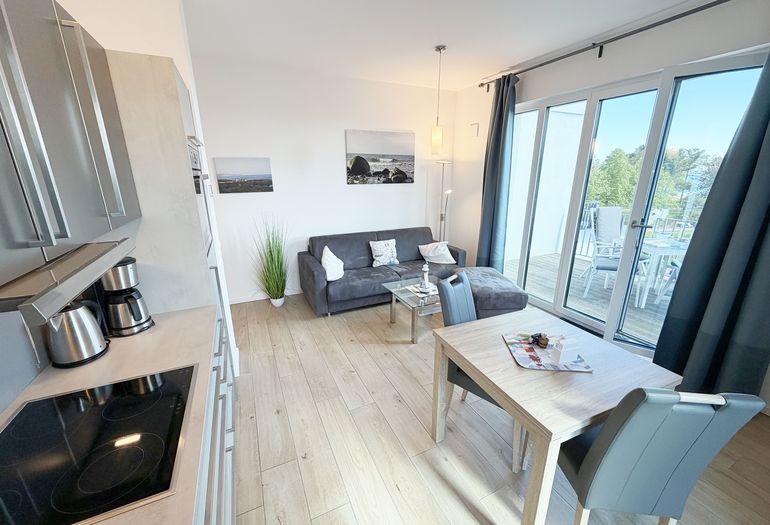 Villa Düne Whg. 19 Penthouse - Wohnzimmer Villa Düne Whg. 19 Penthouse - Wohnzimmer
