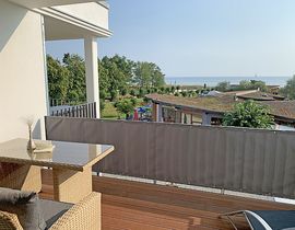 Villa Düne Whg. 14 mit Balkon/Meerblick & Sauna