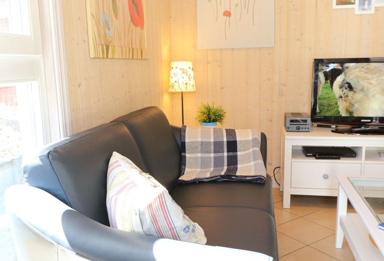 Ferienhaus Sandkörnchen - gemütliche Couch