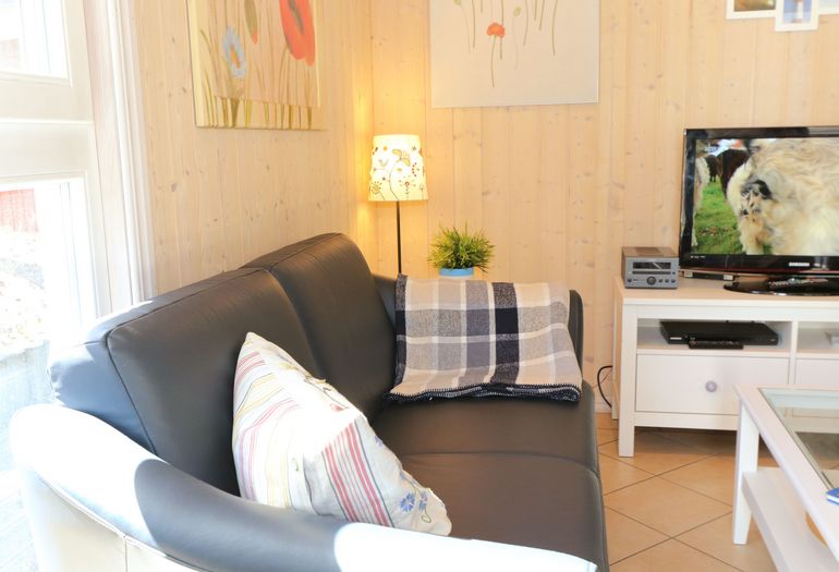 Ferienhaus Sandkörnchen - gemütliche Couch