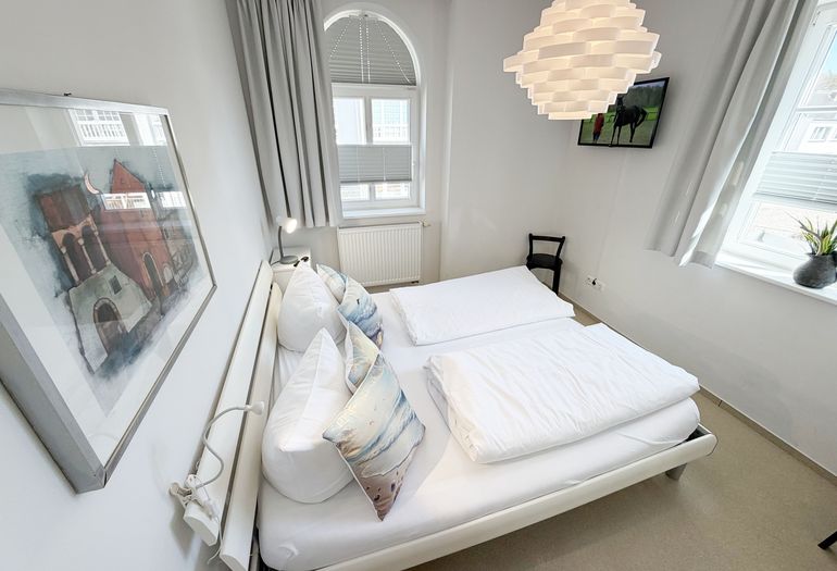 Schlafzimmer mit Doppelbett Schlafzimmer mit Doppelbett