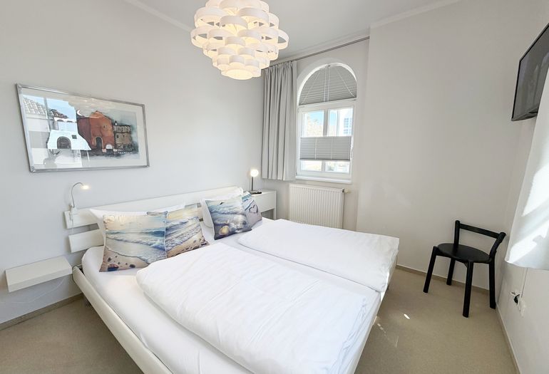 Schlafzimmer mit Doppelbett Schlafzimmer mit Doppelbett