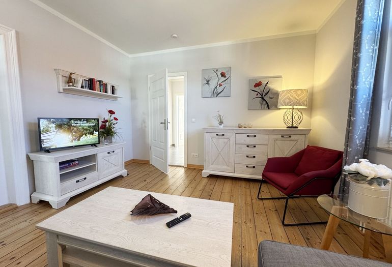 gemütlicher Wohnbereich mit Flachbild-TV gemütlicher Wohnbereich mit Flachbild-TV