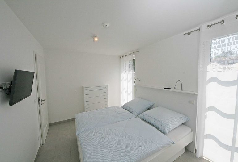 1. Schlafzimmer mit Doppelbett 1. Schlafzimmer mit Doppelbett