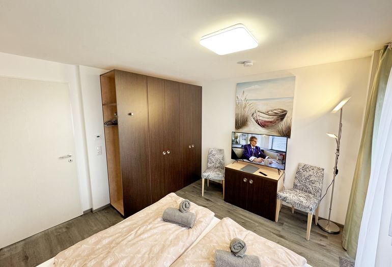 Wohn-/Schlafbereich mit Sitzmöglichkeit