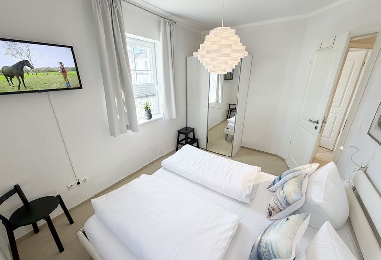 Schlafzimmer mit Doppelbett Schlafzimmer mit Doppelbett