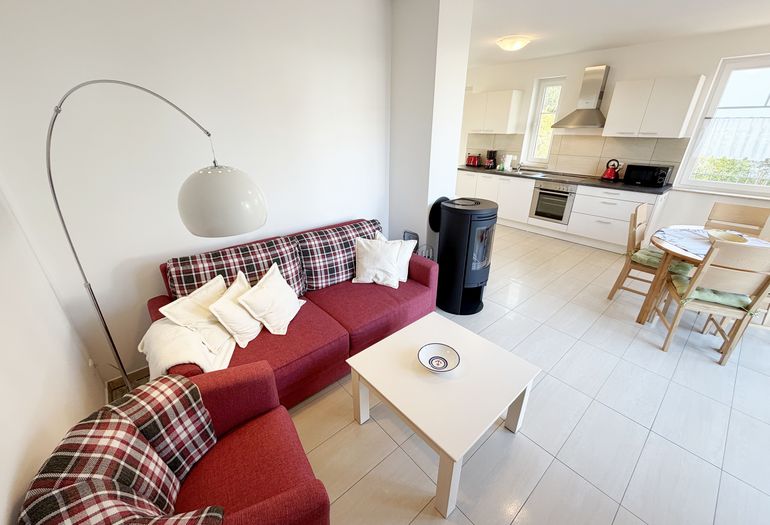 Haus Möwe Wohnung 01 - Couch und TV Bereich Haus Möwe Wohnung 01 - Couch und TV Bereich