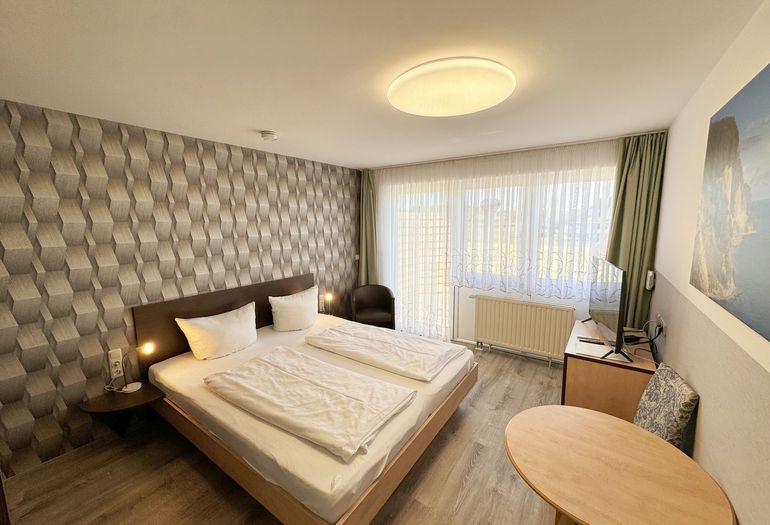 Schlafbereich mit Zugang zur Terrasse