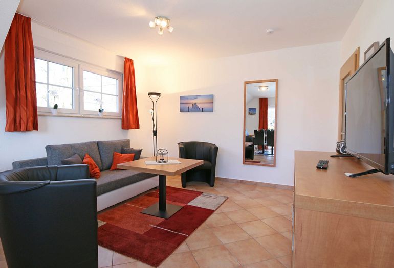 Wohnbereich mit TV Wohnbereich mit TV