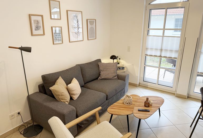 Haus Meeresblick A 1.26 Seegeflüster - Wohnzimmer Haus Meeresblick A 1.26 Seegeflüster - Wohnzimmer