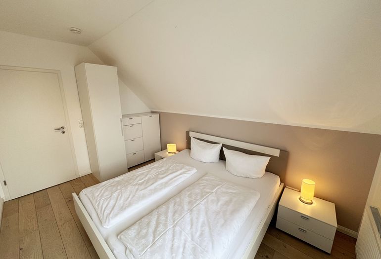 Ferienhaus Ilsebill - 2. Schlafzimmer mit Kleiderschrank Ferienhaus Ilsebill - 2. Schlafzimmer mit Kleiderschrank