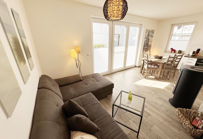 gemütlicher Wohnbereich mit Couch gemütlicher Wohnbereich mit Couch