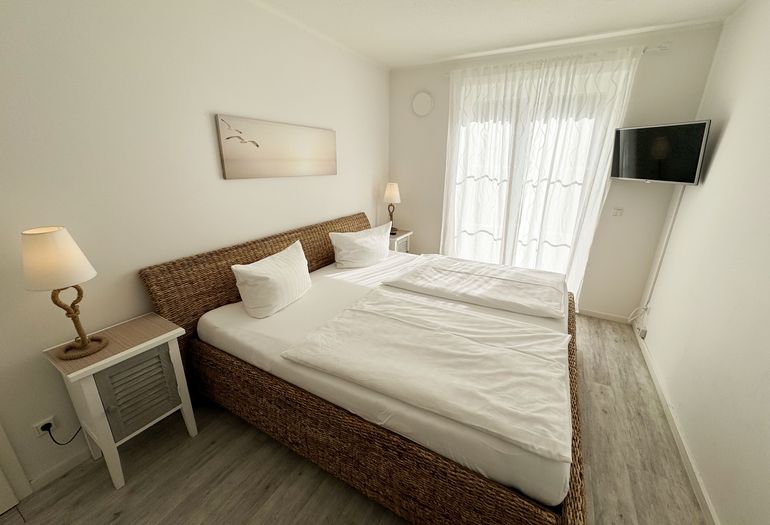 Schlafzimmer mit Doppelbett