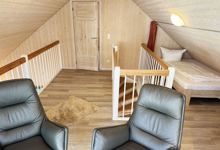 Ferienhaus Sprottenkiste - Blick auf die Galerie Ferienhaus Sprottenkiste - Blick auf die Galerie