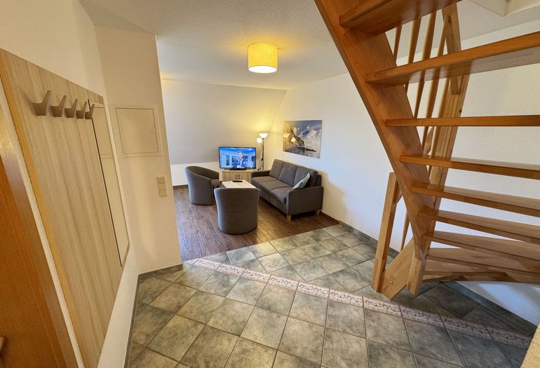 Flurbereich mit Blick auf das Wohnzimmer Flurbereich mit Blick auf das Wohnzimmer