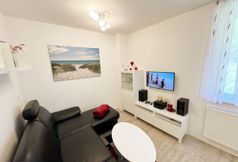 Wohnbereich mit TV Wohnbereich mit TV